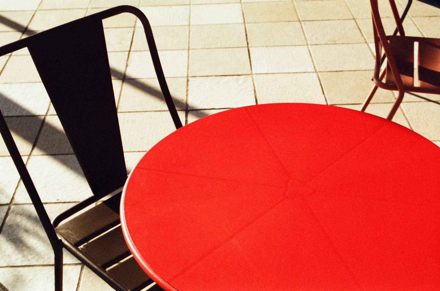 Red table and black chair (Pic: Courtesy of Adox)